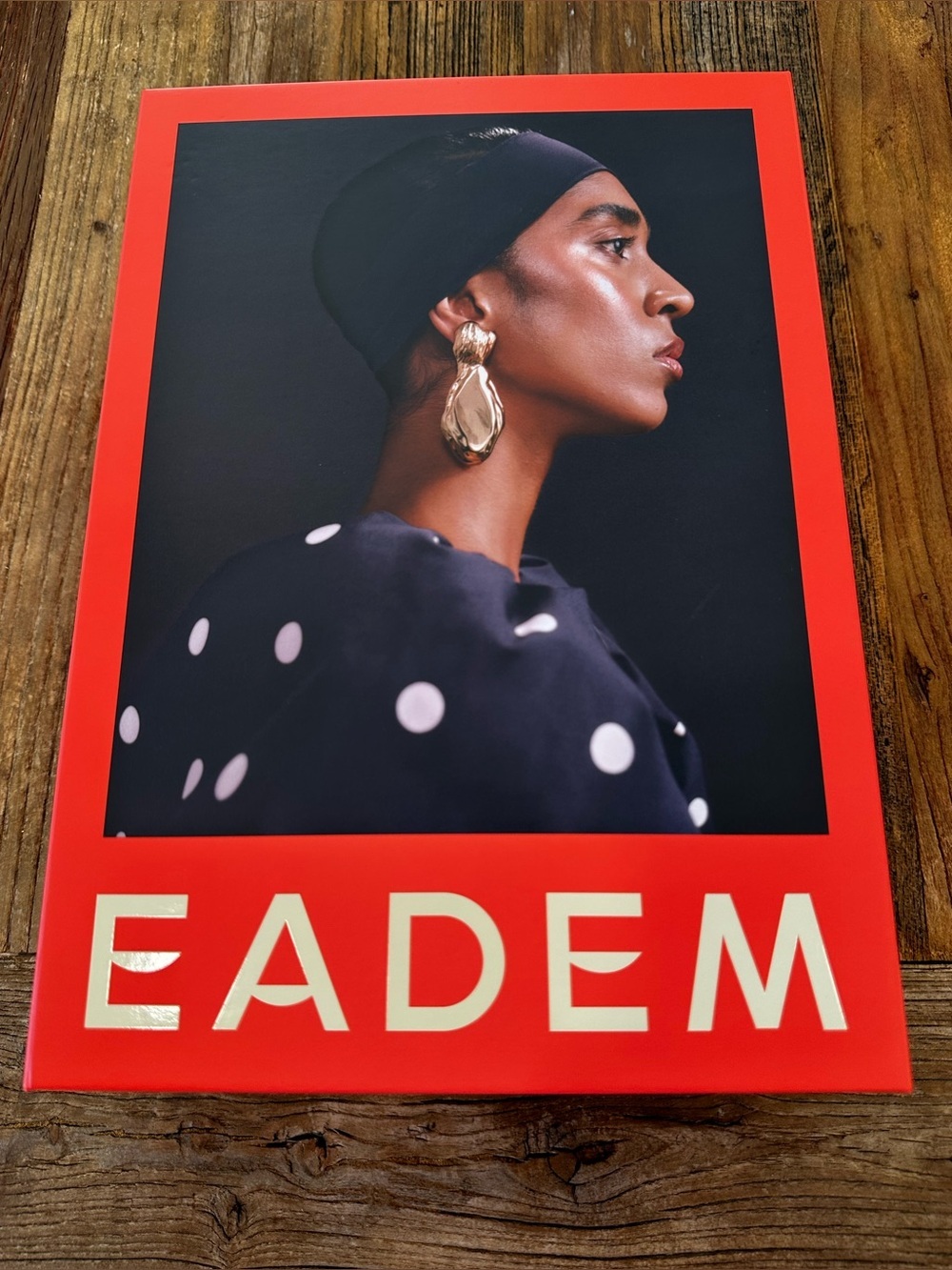 EADEM Fashion Poster — Black & Red with Gold Accents empty box
